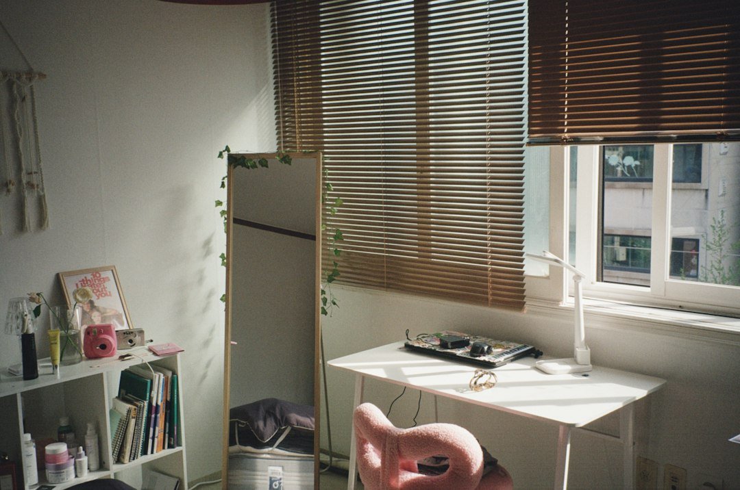 A bright room with a desk and chair, creating a comfortable corner for watching anime