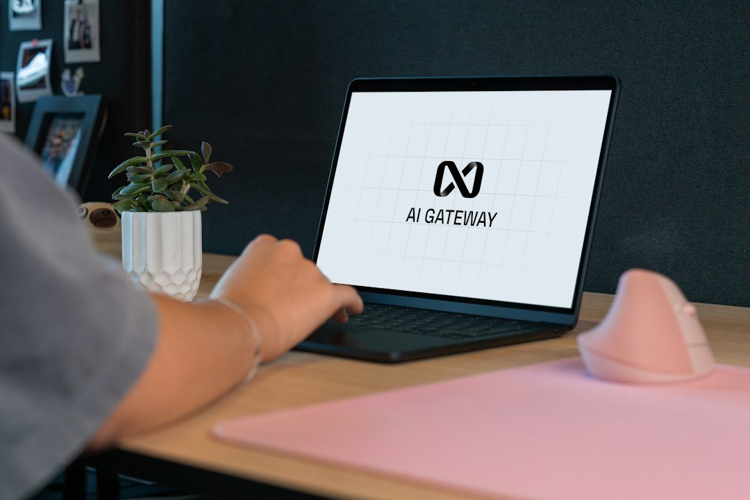 A person using a laptop at a desk while exploring digital tools